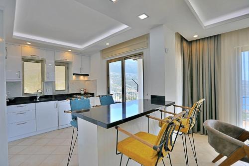 Η κουζίνα ή μικρή κουζίνα στο Villa Asya