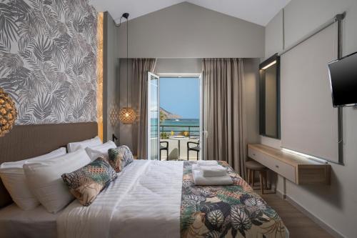 Postel nebo postele na pokoji v ubytování Mare Blue Suites