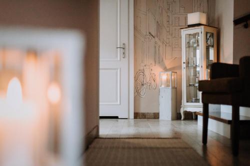 a living room with a refrigerator in a room at Willa Sepia SPA in Wisła