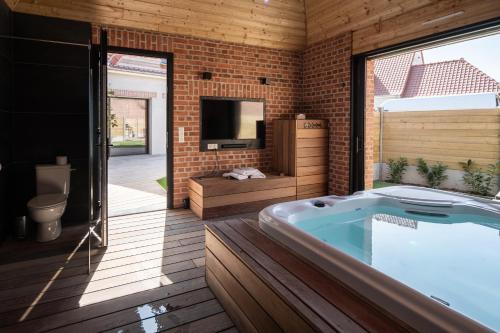 ภาพในคลังภาพของ Au Coeur Du Village ในSaint-Aubin