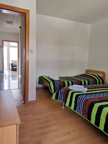Postelja oz. postelje v sobi nastanitve Lake View Apartment Ohrid