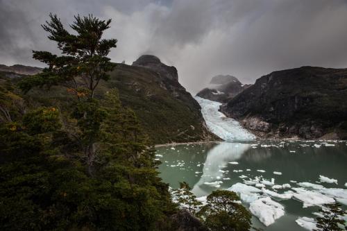 a view of a river flowing through a mountain at The Singular Patagonia Hotel in Puerto Natales