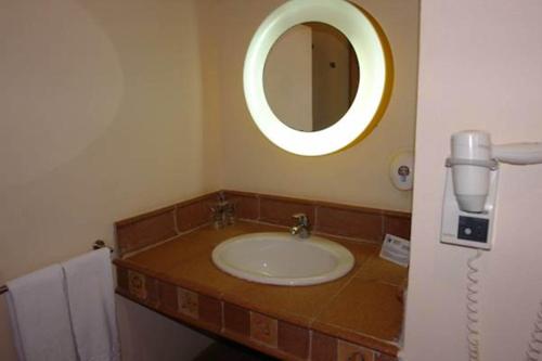 Ванная комната в Flag Hotel Foya Branca