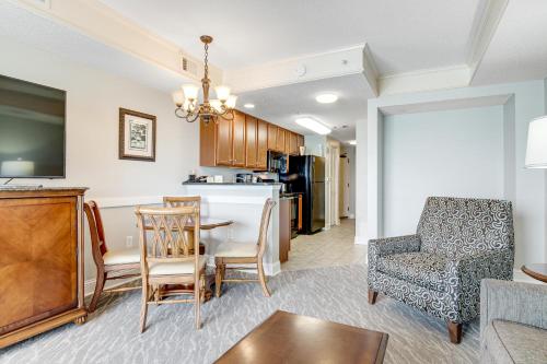 a kitchen and living room with a table and chairs at Anderson Ocean Club and Spa by Oceana Resorts in Myrtle Beach