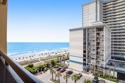 a view of a hotel and the beach from a balcony at Anderson Ocean Club and Spa by Oceana Resorts in Myrtle Beach