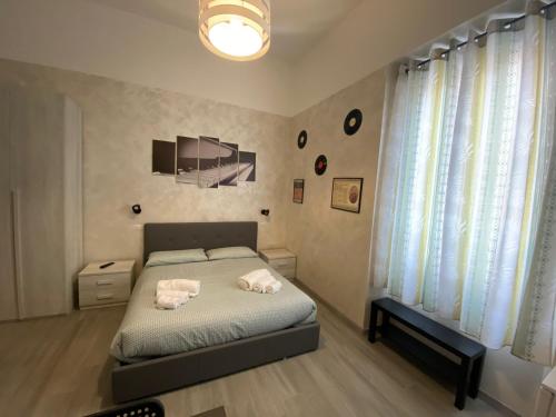 Posteľ alebo postele v izbe v ubytovaní B&B La Sinfonia