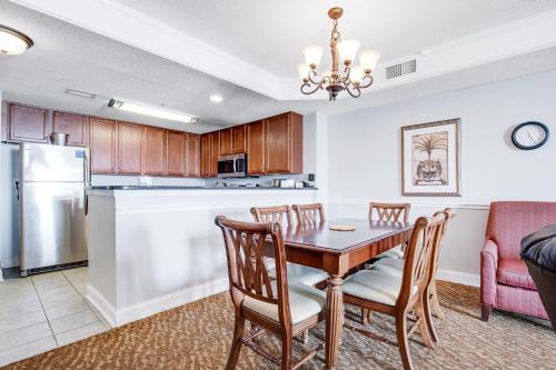 a kitchen and dining room with a table and chairs at Anderson Ocean Club and Spa by Oceana Resorts in Myrtle Beach