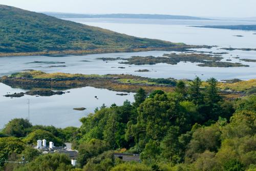 an island in the middle of a body of water at Cashel House Hotel in Roundstone