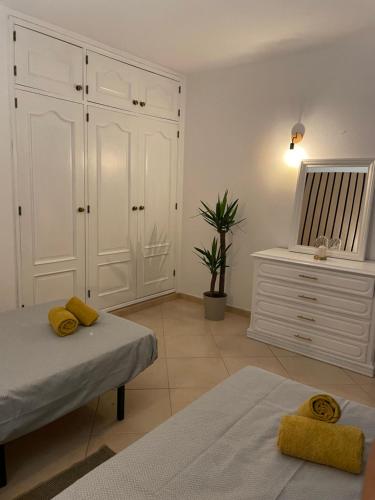 Ένα ή περισσότερα κρεβάτια σε δωμάτιο στο Travellers Guesthouse