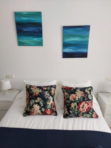 Ένα ή περισσότερα κρεβάτια σε δωμάτιο στο Apartament de Marieta del Delta