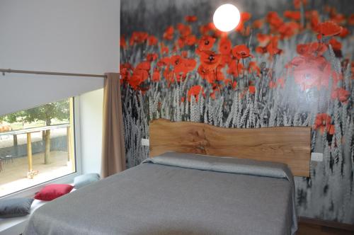 Agriturismo Castoldaにあるベッド