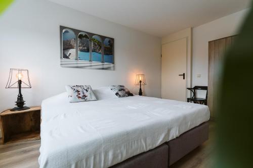 Postel nebo postele na pokoji v ubytování Appartement in Zeeland - Kabbelaarsbank 2E - Port Marina Zélande - Ouddorp