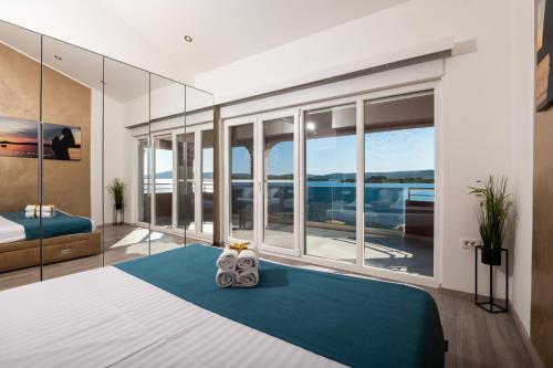 Postel nebo postele na pokoji v ubytování Euroholiday apartments