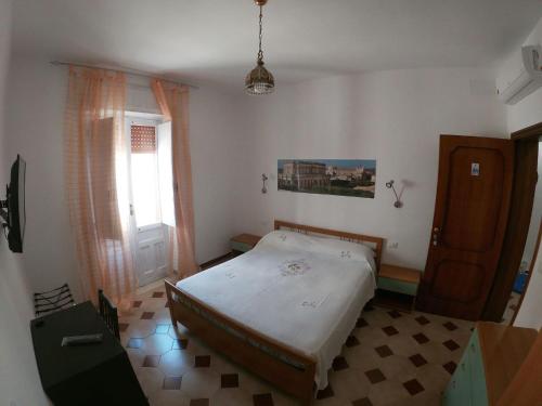 Postel nebo postele na pokoji v ubytování Casa NILLA