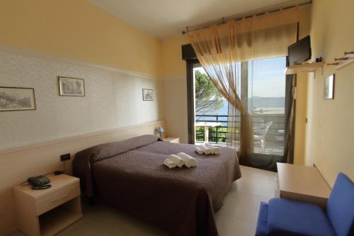 Postel nebo postele na pokoji v ubytování Hotel Aquavite