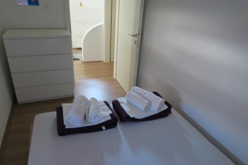Posteľ alebo postele v izbe v ubytovaní Holiday Home Ljubičić