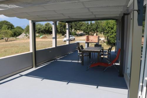 Balkoni atau teres di Nane Garden house with heated pool