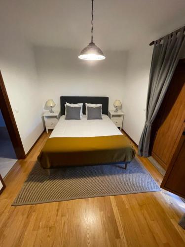 Letto o letti in una camera di Casa do Pedrógo