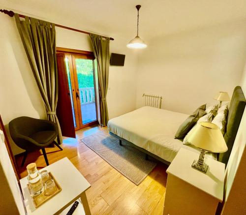 Letto o letti in una camera di Casa do Pedrógo