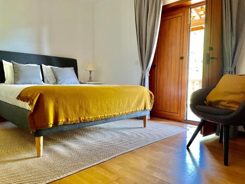 Letto o letti in una camera di Casa do Pedrógo