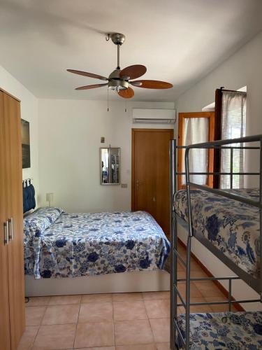 Postel nebo postele na pokoji v ubytování Casetta Elda