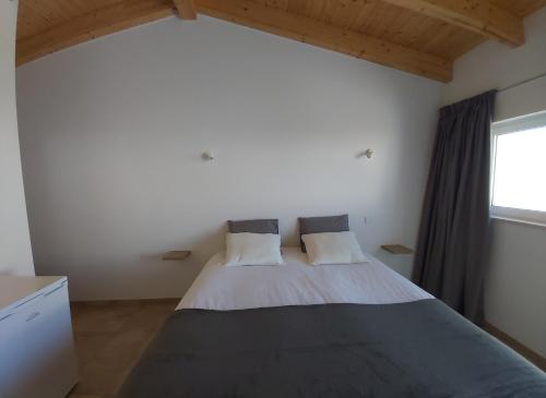 Кровать или кровати в номере Monte Bagão - Turismo Rural