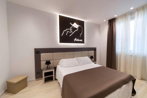 Katil atau katil-katil dalam bilik di Hotel La Gradisca