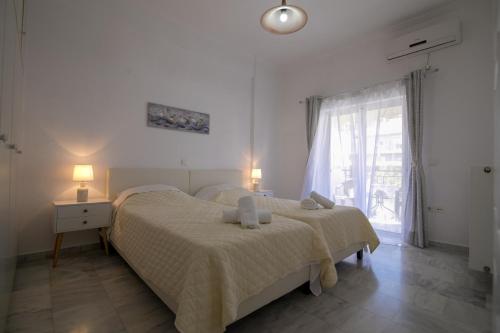 Postel nebo postele na pokoji v ubytování Aias luxury apartment