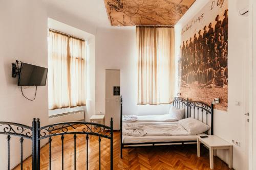 Кровать или кровати в номере Hostel Franz Ferdinand
