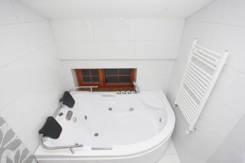 Un baño de Hotel Happy