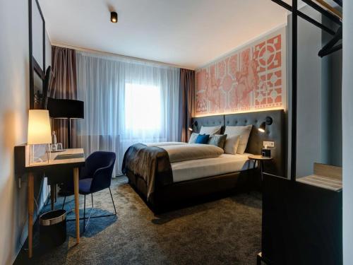 Letto o letti in una camera di YORS Boutique Hotel