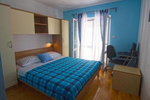 Postel nebo postele na pokoji v ubytování Apartment Domagoj