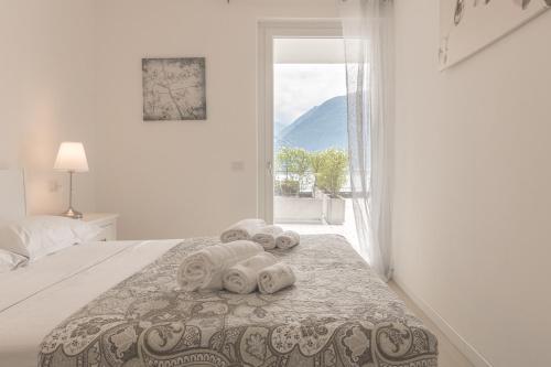 Postel nebo postele na pokoji v ubytování Apartment Azalea - Cremia