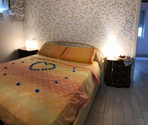 Postel nebo postele na pokoji v ubytování Domus Luciae