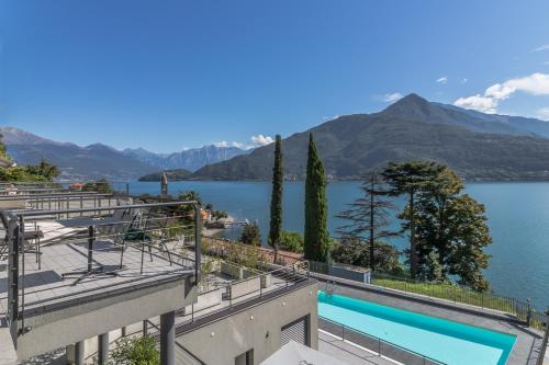 a view of the lake from the balcony of a building at Apartment Azalea - Cremia in Cremia