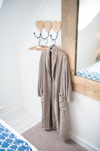 Katil atau katil-katil dalam bilik di Kalvåg Holidayapartment