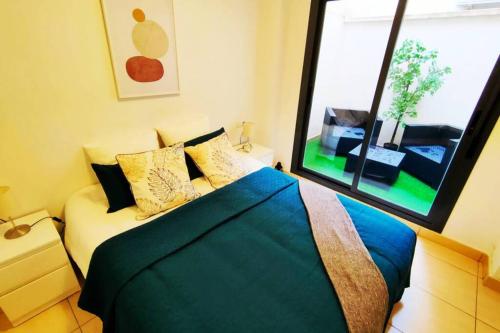 Llit o llits en una habitació de Donoso Cortes Apartment - Alicante