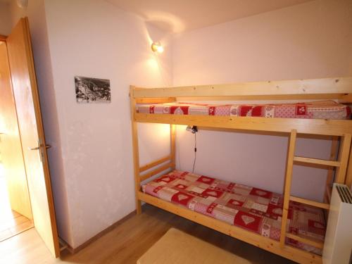 a small room with two bunk beds in it at Studio Les Saisies, 1 pièce, 4 personnes - FR-1-293-169 in Les Saisies