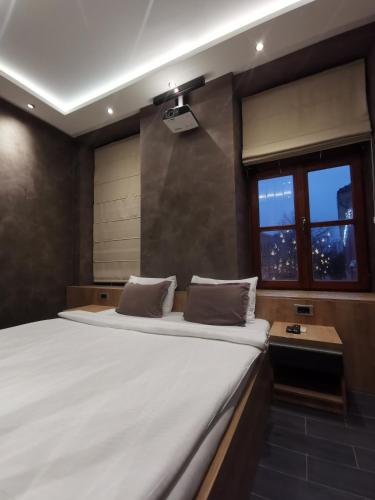 Säng eller sängar i ett rum på Lux A28