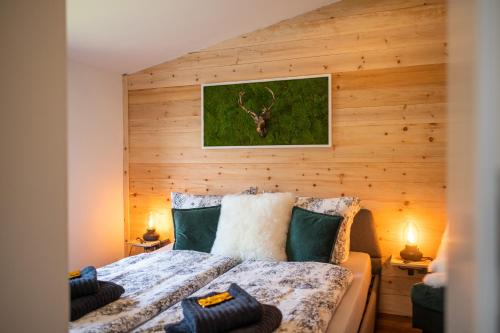 Postel nebo postele na pokoji v ubytování Haus am Wald