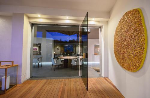 a room with a table and a dining room at Hotel Royal Paestum in Paestum