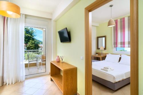 Postel nebo postele na pokoji v ubytování Aelia Villa