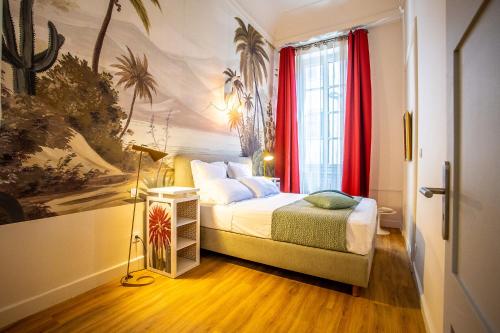 Le Belem في قرقشونة: غرفة نوم بسرير ونافذة ذات ستائر حمراء