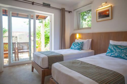 Mekvin Hotels Deniz Feneri Lighthouseにあるベッド