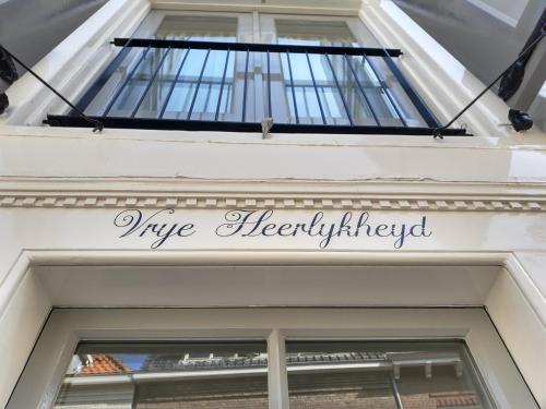a sign on the front door of a fire hydrant at VRYE HEERLYKHEYD ( adults only ) studio 2 in Middelburg