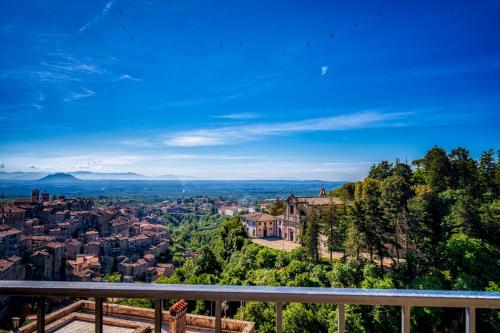 a view of a city from a balcony at Casa Checca e Casa Maria appartamenti per vacanze in Caprarola