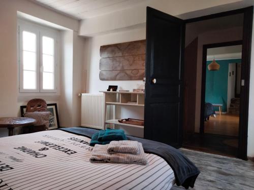 Postel nebo postele na pokoji v ubytování Le clos de CINACLE
