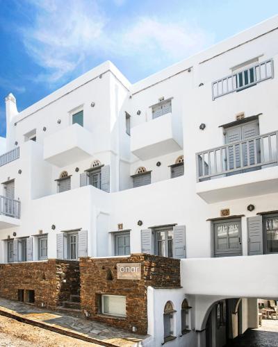 an image of a white building at Onar Hotel & Suites in Tinos Town