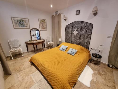 Ένα ή περισσότερα κρεβάτια σε δωμάτιο στο La Bastide