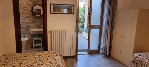 Katil atau katil-katil dalam bilik di B&B Villa Refe